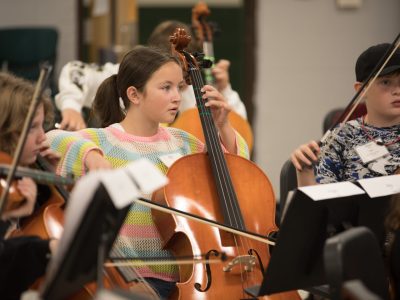 Summer Strings student playing Cello